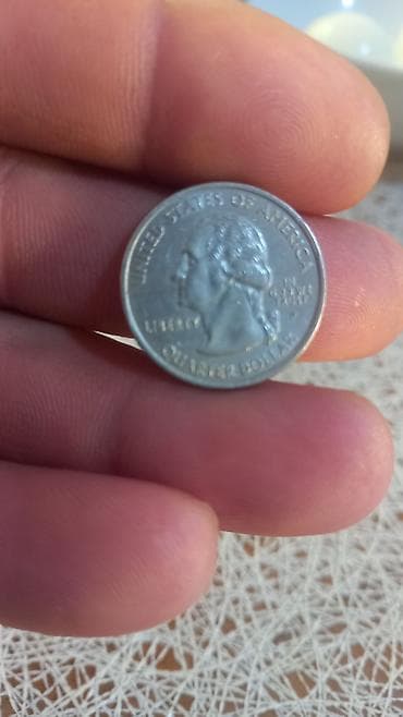 Kitablar və jurnallar: ABŞ 25 sent – Nevada ştatı xatirə sikkəsi (2006) - Seriya: 50 State — 2