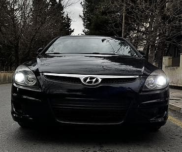 Motonəqliyyat: Hyundai i30 hatchback - Korpus: 5 qapılı, qara rəng, arxa şüşə tünd — 8