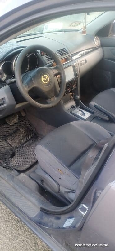 hediye qutusu: Mazda 3: 1.6 l | 2008 il Sedan — 5