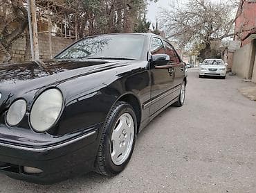 arxa suse: Mercedes-Benz E-Class: 2.2 l | 1999 il Sedan — 2
