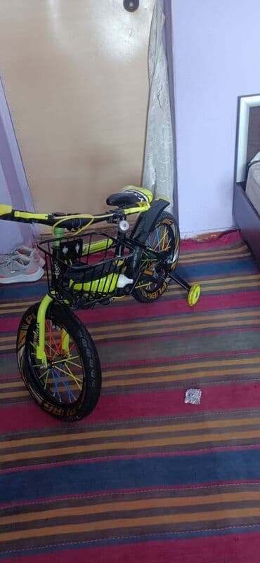 велосипеды 14 дюймов: Uşaq velosipedi – parlaq sarı/qara rənglərdə Xüsusiyyətlər: - 16 — 1
