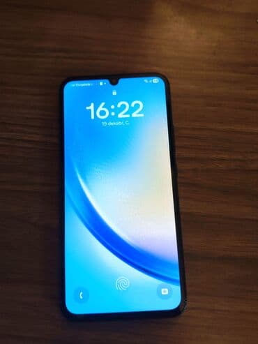 qaz peci gence: Smartfon – qara rəng Xüsusiyyətlər: - Ekran: tam ekran ön panel — 2