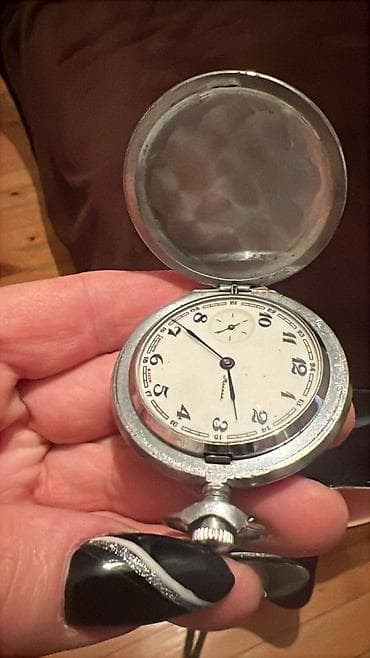 saatli: Məhsul: mexaniki cib saatı (qapaqlı) Xüsusiyyətlər: - Klassik qapaqlı — 1