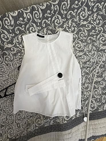 yun svitertlər: Ağ rəngli qadın bluzu – Trendyol etiketi - Model: qolsuz, dairəvi — 1