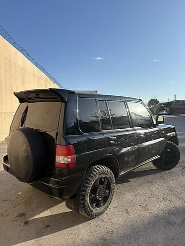 04 maşınlar: Mitsubishi Pajero: 1.8 l | 2000 il 394000 km Ofrouder/SUV — 3