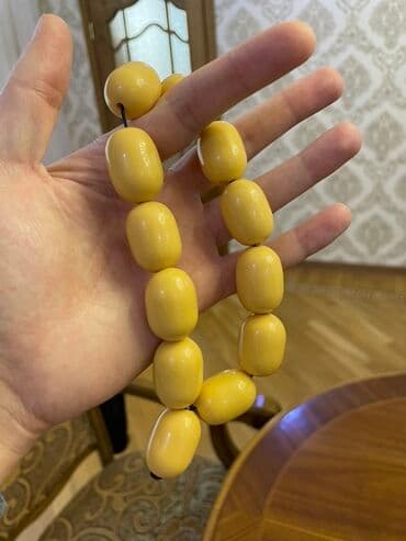 yuxuda qizil itirmek: İri daşlı kəhrəba bənzətmə təsbeh.Köhnədir — 1