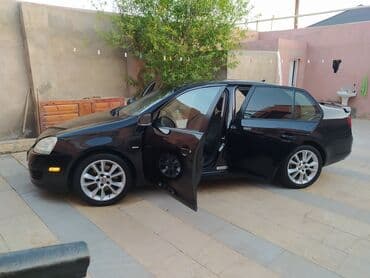 oturucu: Volkswagen Jetta: 2 l | 2009 il Sedan — 7