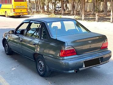 kia shuma 2003: Daewoo Nexia: 1.5 l | 2001 il Sedan — 4