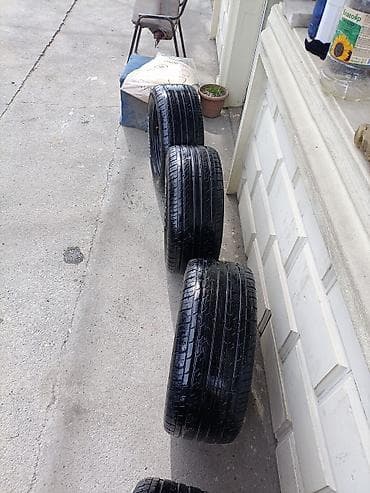 Digər nəqliyyat: Şin Roadstone 215 / 50 / R 13 — 9