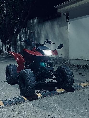 Kvadrosikllar: Qırmızı rəngli ATV (kvadrotsikl) - Güclü dörd təkərli ofroud — 2