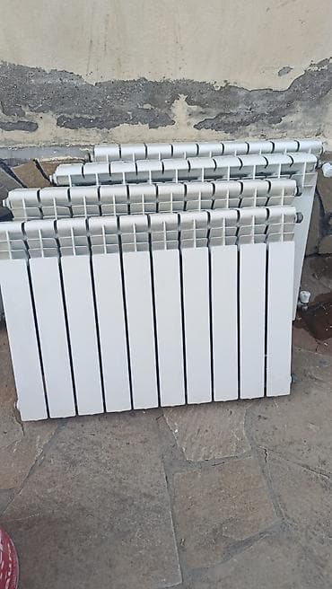 kombi radiatoru: Seksiya radiyator 39 ededdir. 1ededi 7 azn krantlari uzerindedir — 1