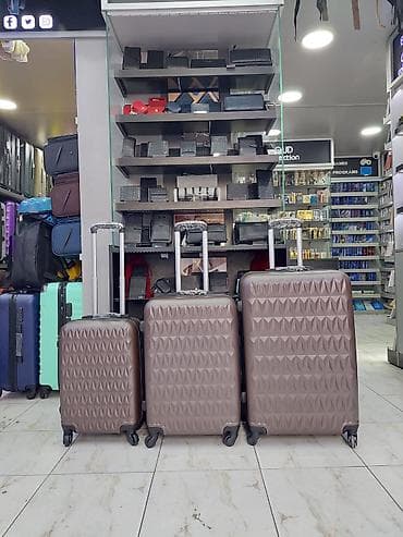 tekerli çantalar: Sərnişin çamadan dəsti – 3 ölçü - Rəng: qəhvəyi/bronza ton - Korpus — 1