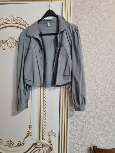 Boz rəngli iki hissəli spor dəst 60 man alinib 20 man satilir 1 defe