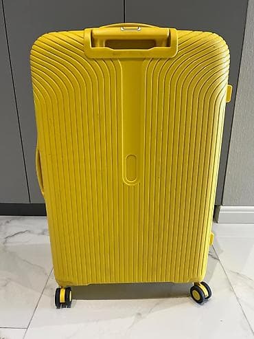 Спортивное питание: Sarı rəngli sərt qabıqlı çamadan səyahət üçün nəzərdə tutulmuşdur — 2