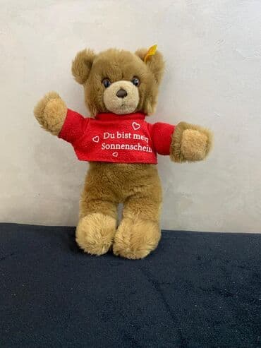 ayı pəncəsi yağı qiyməti: Qəhvəyi rəngli, yumşaq oyuncaq ayı. Ayının əlləri və qulaqları qırmızı — 2