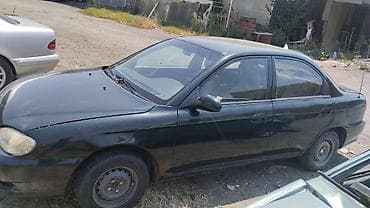 jeton satişi: Kia Sephia: 1.6 l | 1997 il Sedan — 4