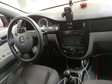 daf ati 400: Daewoo Gentra: 1.5 l | 2013 il Sedan — 5