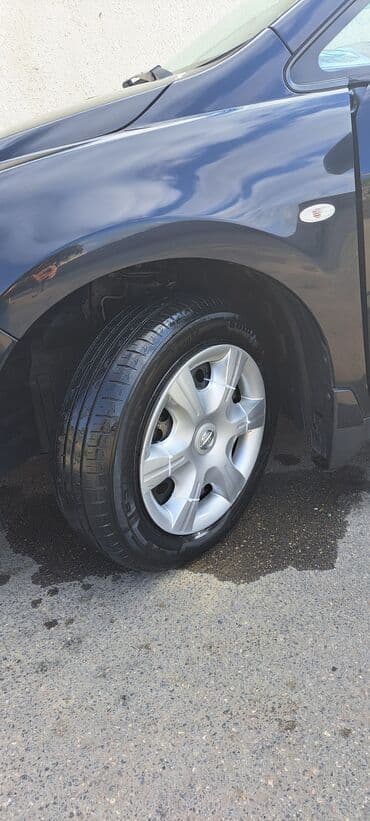 faizsiz kreditlə maşın: Nissan Tiida avtomobili hər gün rahat istifadə üçün nəzərdə tutulmuş — 15