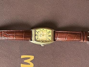 Toy paltarları və aksesuarları: Satılır vintage qol saatı. Saat təxminən 1940–1950-ci illərə aid — 1