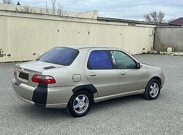 şam diskilər: Fiat Albea sedan - Kuzov: 4 qapılı sedan, bej rəng (bəzı hissələrdə — 4