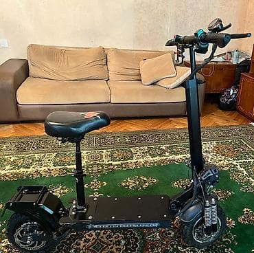 Elektrik nəqliyyatı: Elektrik skuter – oturacaqlı, güclü asqılı və geniş platformalı, 60 km — 2