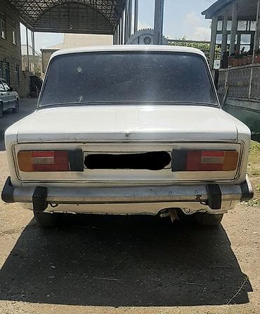 VAZ 2106, ağ rəngli sedan. Texniki xüsusiyyətlər: - Kuzov: sedan
