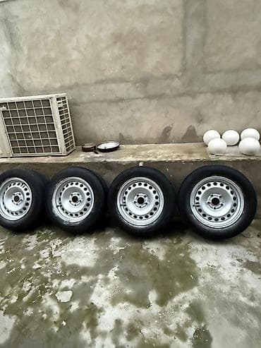 teker traktor: 4 ədəd avtomobil diski və şini komplekti Opel Astra üstünde açmışam — 2