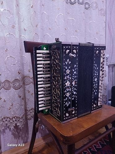 Qarmon, Akustik, İşlənmiş, Ünvandan götürmə