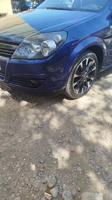 kia forte diffuser: Opel ASTRA 2004 il — 3
