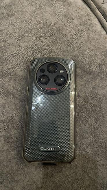 Oukitel smartfon - Marka/model: Oukitel (arxa qapaqda loqo). - — 2