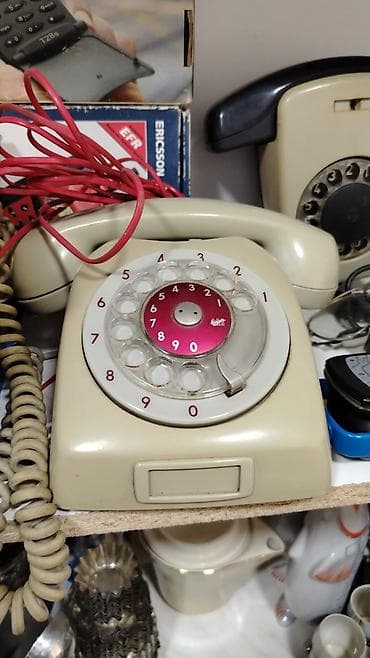 Stasionar telefon Simli