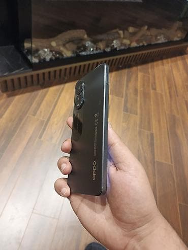 duymeli telefon: Oppo A78, 256 GB, rəng - Boz, Barmaq izi — 4