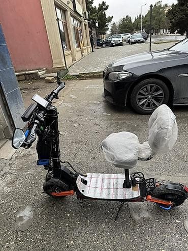bokus elceyi: Elektrik skuter – oturacaqlı, güclü işıqlandırma və aksesuarlarla — 7
