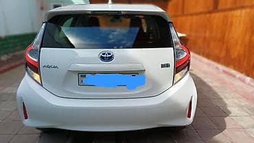 06 masin sekilleri: Toyota Aqua: 1.5 l | 2019 il Hetçbek — 4