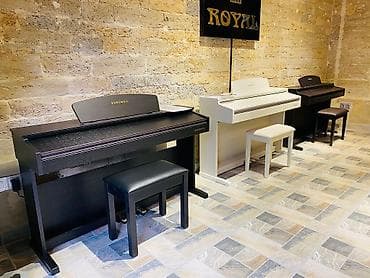 Koreya istehsali olan dünya şöhrətli kurzweil pianoları. Sevimli — 2