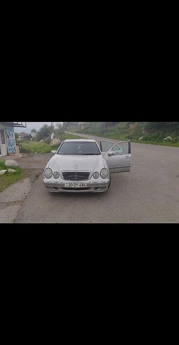 Продажа авто: Mercedes-Benz E-Class sedan (E200 Kompressor emblemli), gümüşü rəng — 6