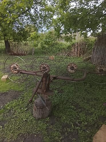 Ot biçən/çırpıcı tırmık – traktor asqısına qoşulan “günəş tırmığı” -