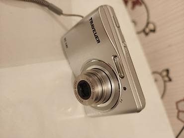 flas: Traveler DC 140 rəqəmsal fotoaparat Istifadə olunmuş fotoaparatdir — 4