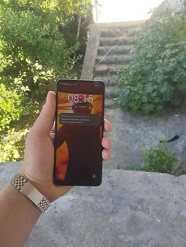 texno telefonlari: Oppo 5i, 128 GB, rəng - Bənövşəyi, Barmaq izi, Simsiz şarj, İki sim kartlı — 5