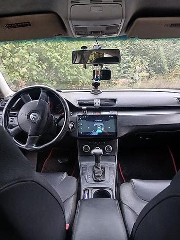 volqa ehtiyat hisseleri: Volkswagen Passat sedan. Avtomobilin salonu qara rəngdədir və ön — 2
