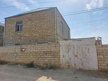 gencede ev: Satılır: daş hasarla əhatələnmiş həyət evi və torpaq sahəsi — 1