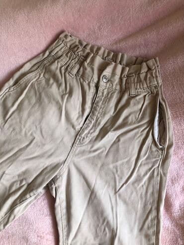 детская школьная одежда: Bej rəngli uşaq şalvarı. Ölçü : XS/S Vəziyyəti: işlənmiş Made in — 1