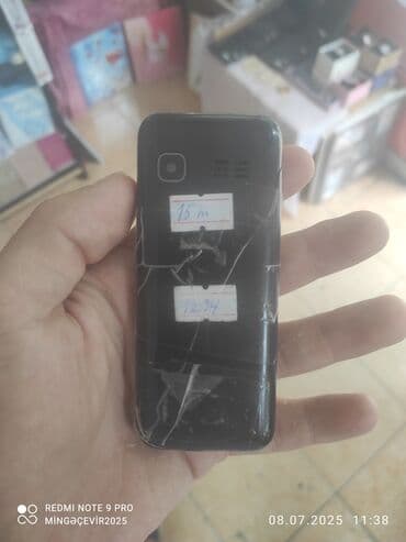 телефон fly ezzy 9: KGTEL markalı, B380 model, boz rəngli düyməli telefon. Bu telefon həm — 2