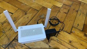 limitsiz data kart: Huawei simsiz router/ONT - Brend: Huawei - Rəng: ağ, ventilyasiya — 1