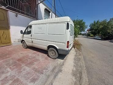sarı ford transit: Ford Transit: 2.5 l | 1998 il 643135 km Van body type — 6