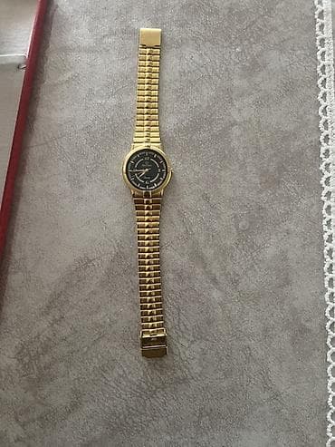 Qızılı rəngdə qol saatı - Korpus və zəncirvari metal qolbaq: qızılı