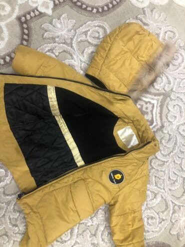 детская желтая одежда: 3-4-5 yaş uçun,panda kıds’den alınıb,az geyınılıb qış ucundur ve sarı — 7