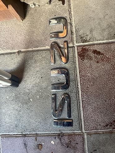bmw e39 spoiler: Isuzu üçün orijinal kuzov işıqları və emblemlər dəsti Tərkib: - Arxa — 4