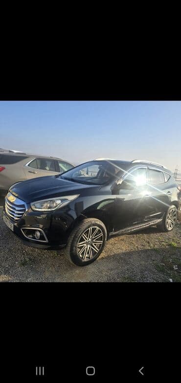 ucuz maşnlar: Hyundai ix35 – qara rəngli şəhər/krosover SUV 2013 170min probeq 2 — 2