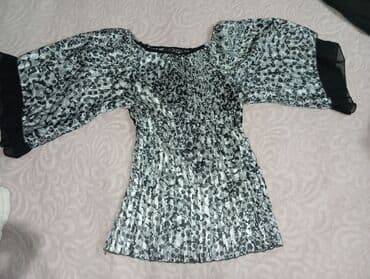 Atlas material gollari garangush modeli